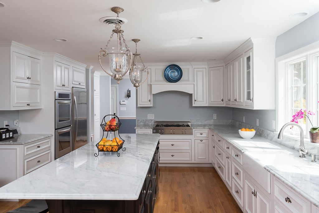 182 River Road Hanover, MA 02339 - Photo 7 of 29 a kitchen with stainless steel appliances granite countertop a stove refrigerator and cabinets