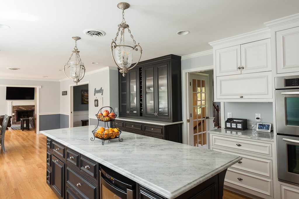 182 River Road Hanover, MA 02339 - Photo 8 of 29 a kitchen with a table chairs and refrigerator