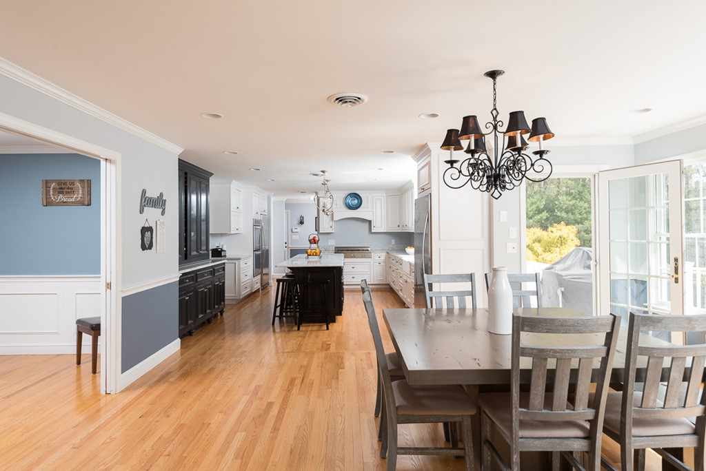 182 River Road Hanover, MA 02339 - Photo 10 of 29 a view of a dining room with furniture and a chandelier