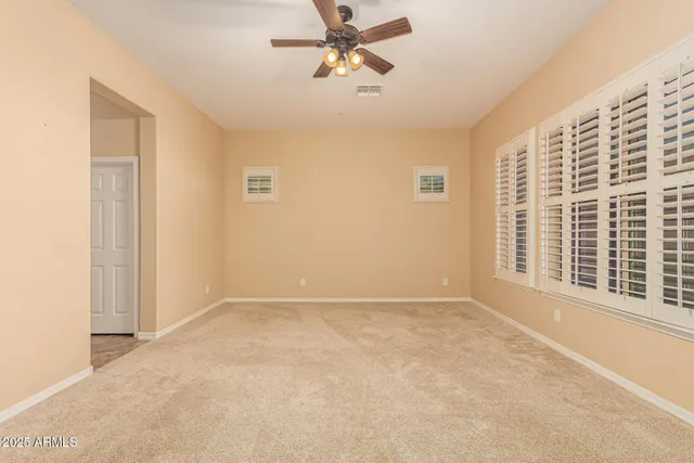 a bathroom with a sink vanity and mirror