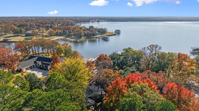 wooden view of a lake with houses