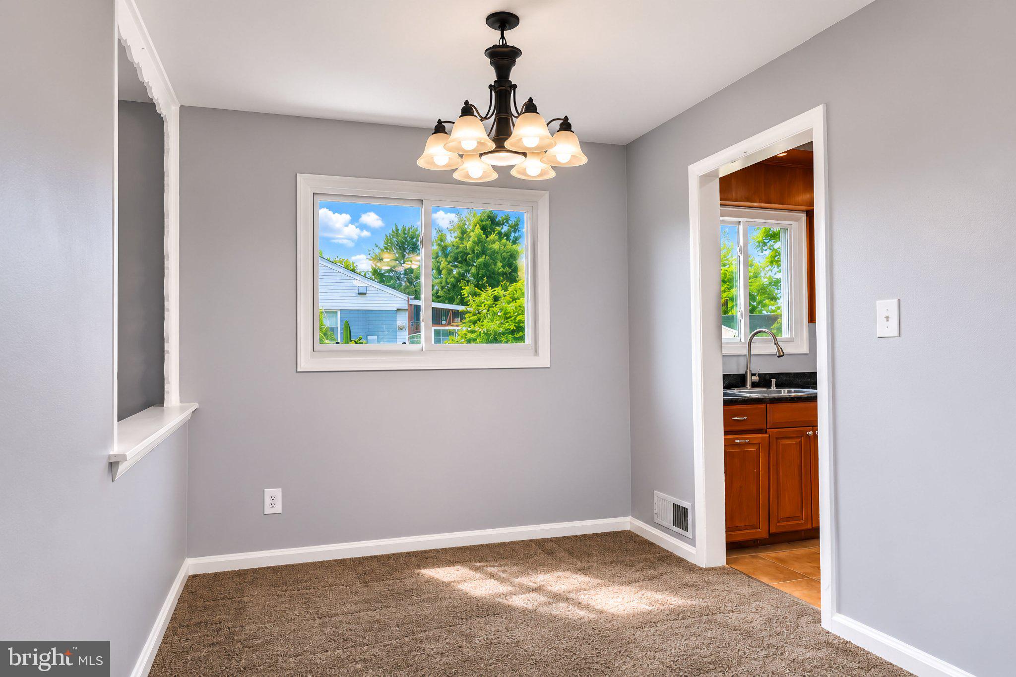 5712 Ash Drive Springfield, VA 22150 - Photo 3 of 38 Bright and airy dining space awaits.