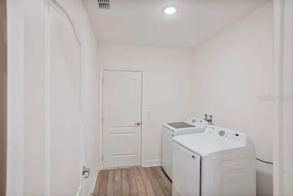 a view of deck with patio and backyard