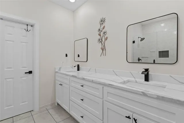 a bedroom with a bed and a walk in closet