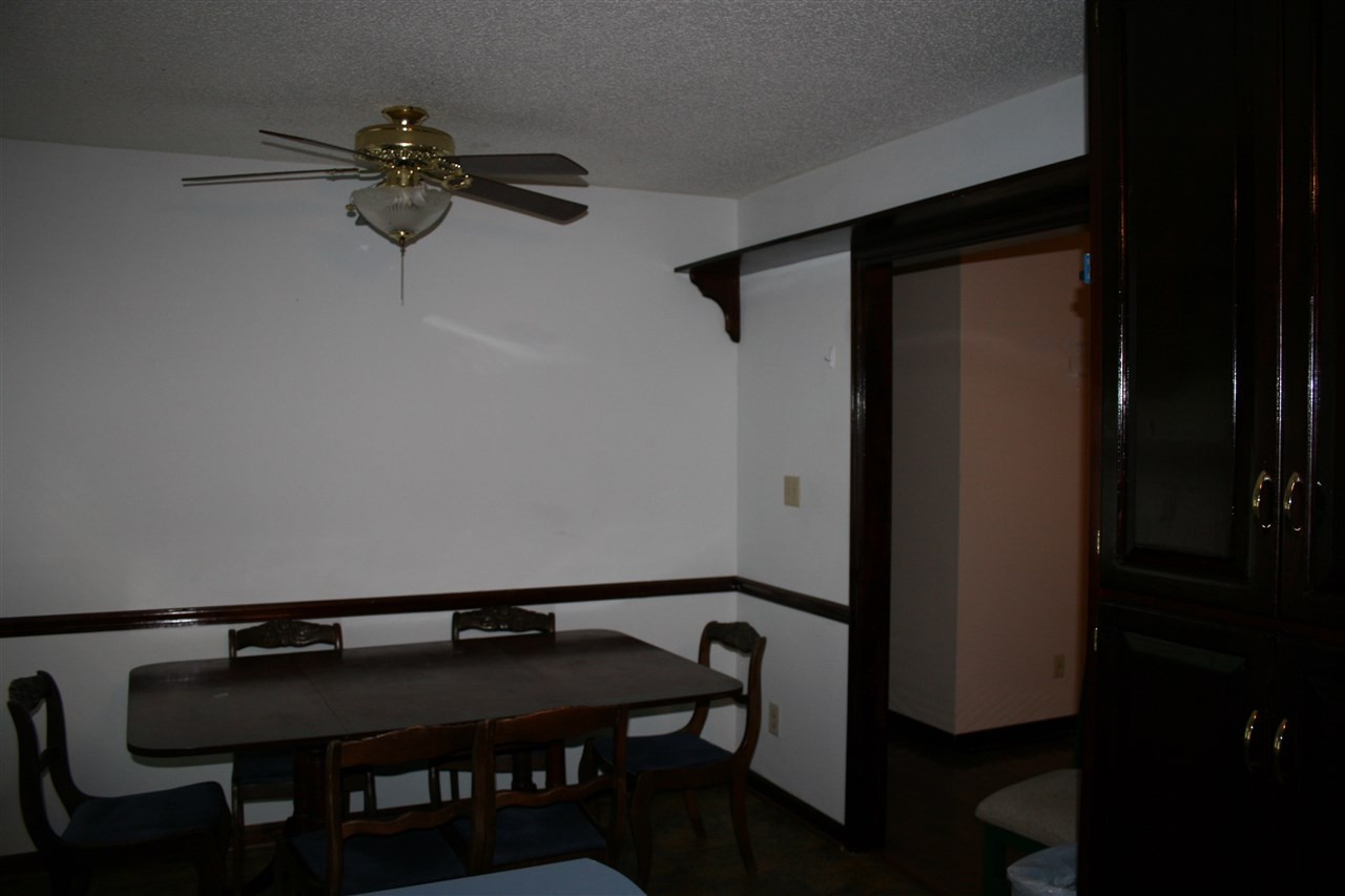 400 Dean Drive Northwest Georgetown, TN 37336 - Photo 15 of 38 a room with a table and a potted plant on a table