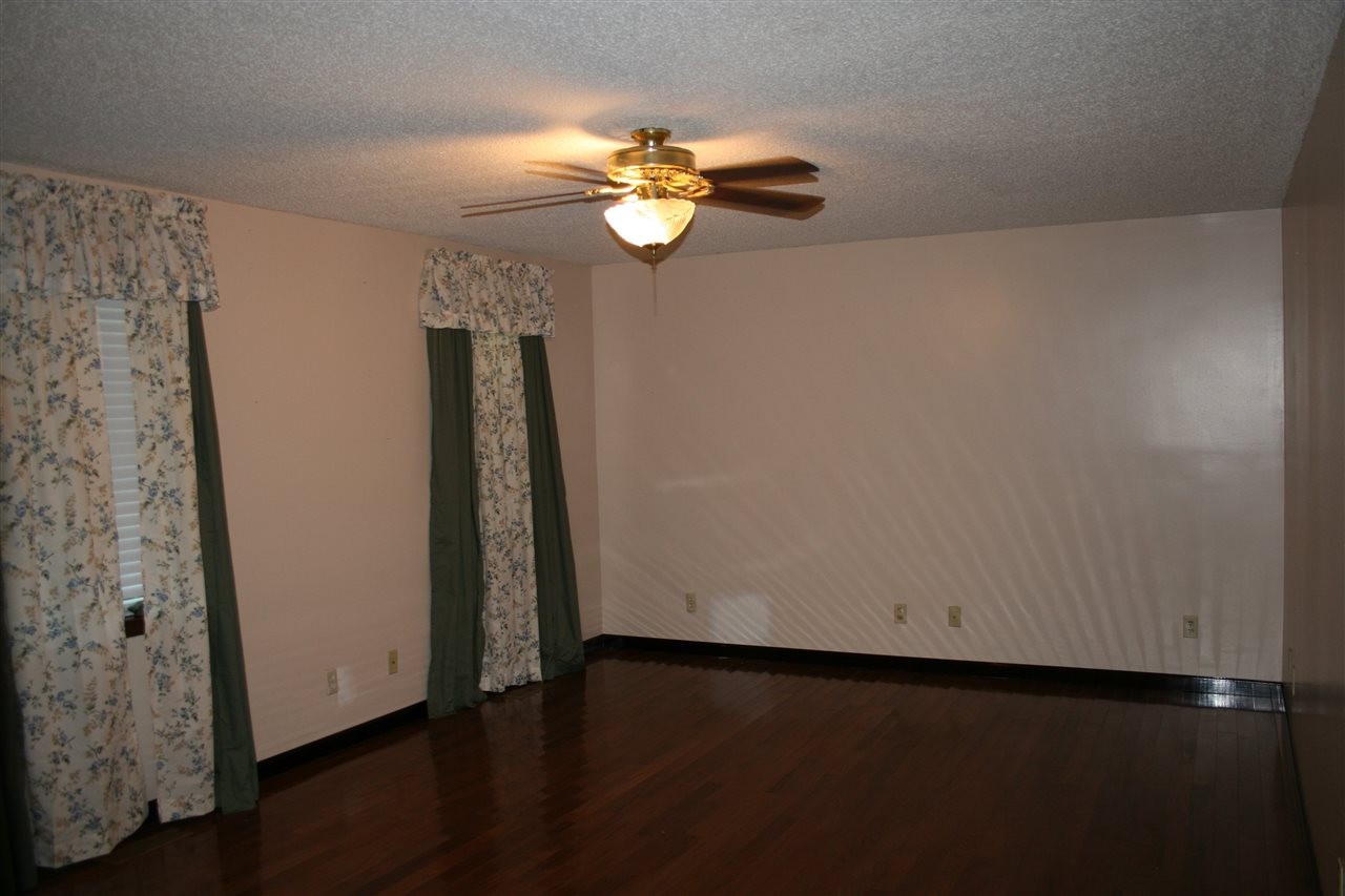 400 Dean Drive Northwest Georgetown, TN 37336 - Photo 19 of 38 a view of a livingroom with wooden floor