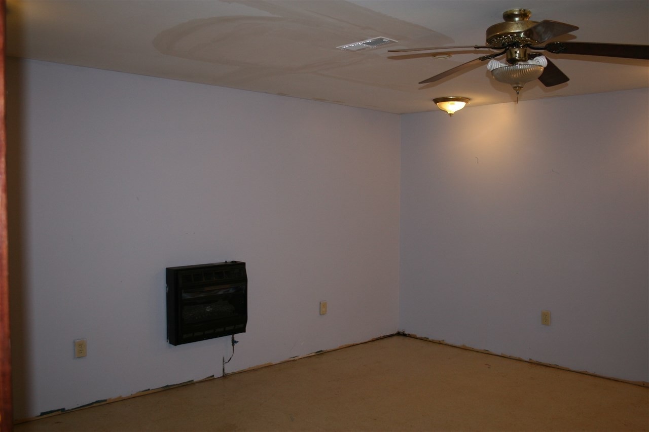 400 Dean Drive Northwest Georgetown, TN 37336 - Photo 24 of 38 a view of a room with a ceiling fan and a window