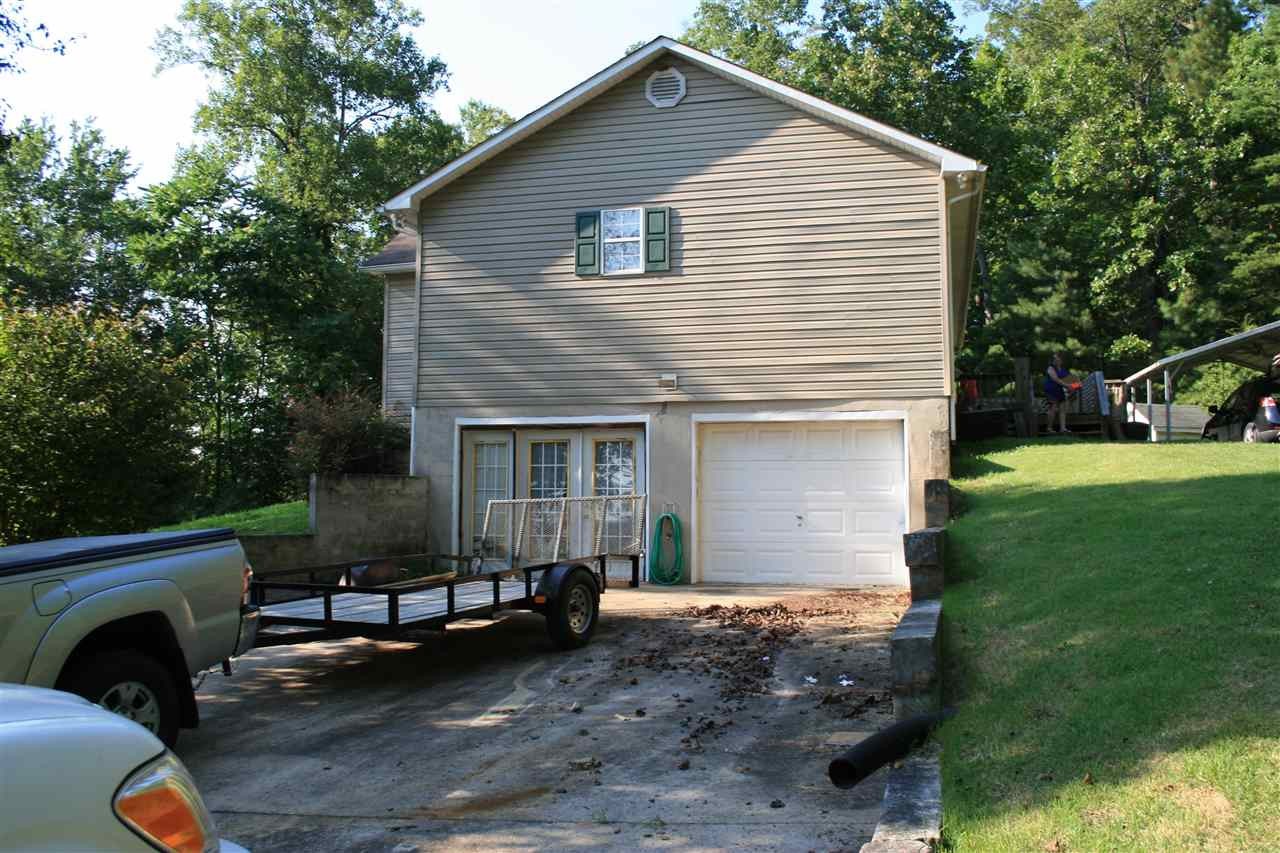 400 Dean Drive Northwest Georgetown, TN 37336 - Photo 27 of 38 a view of backyard with deck and outdoor seating