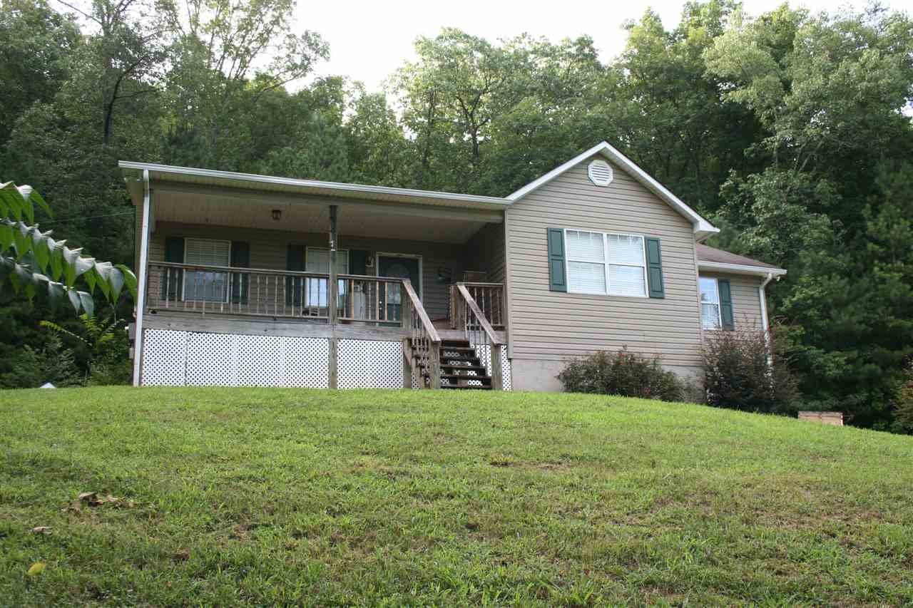 400 Dean Drive Northwest Georgetown, TN 37336 - Photo 3 of 38 a view of a house with a yard and large trees