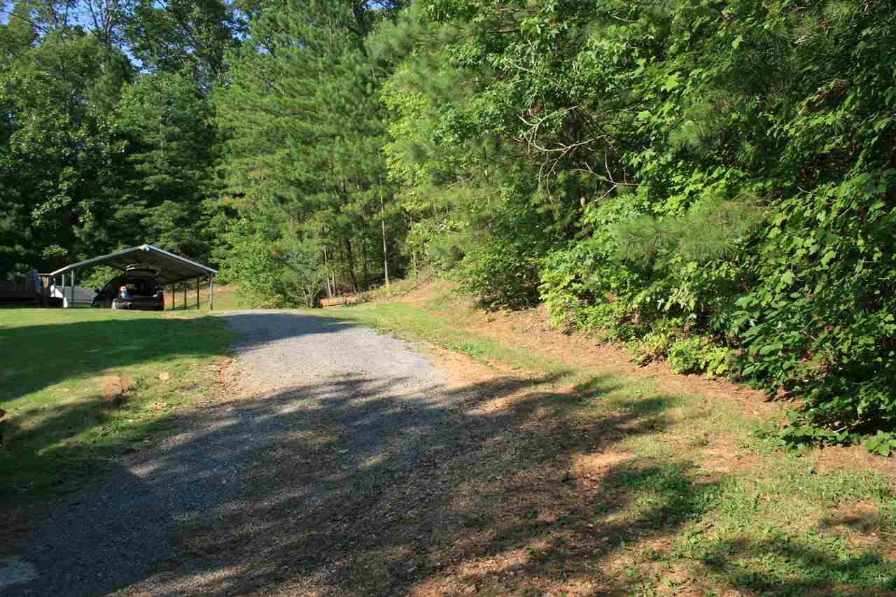 400 Dean Drive Northwest Georgetown, TN 37336 - Photo 36 of 38 a view of a yard with plants and large trees