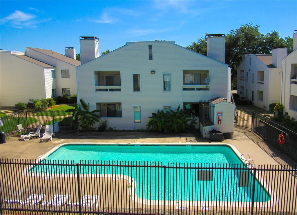 7431 Holly Hill Drive, Unit 216 Dallas, TX 75231 - Photo 14 of 19 a view of a house with a yard porch and sitting area