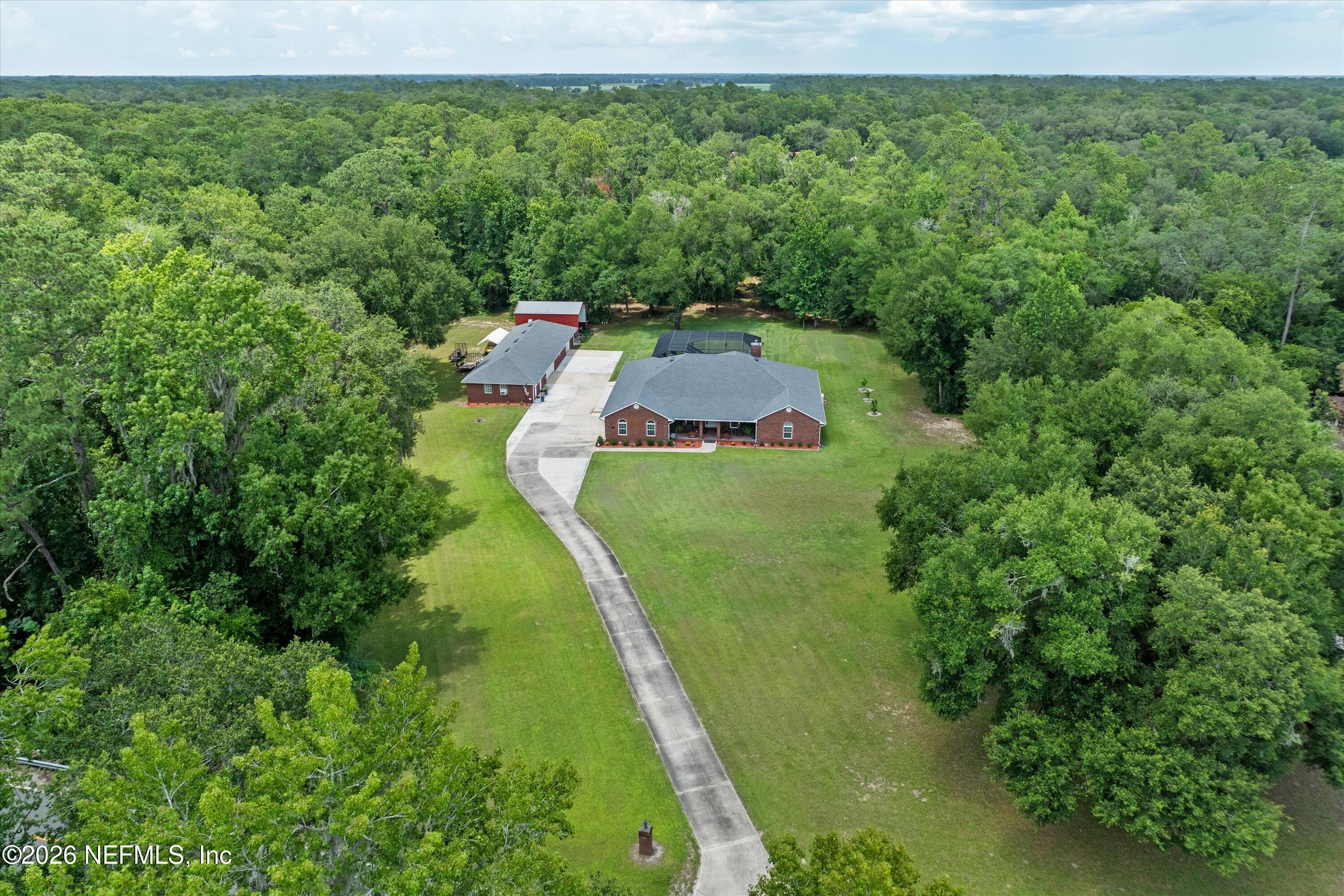5566 Don Manuel Road Elkton, FL 32033 - Photo 45 of 47 an aerial view of a house with a yard