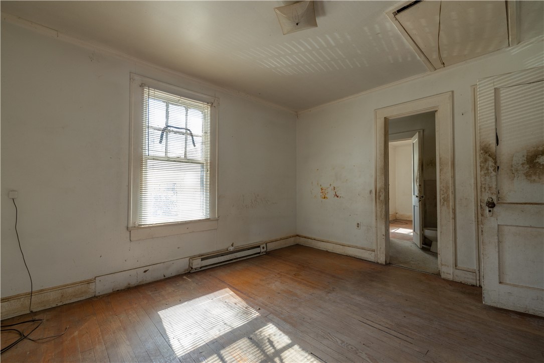 106 Frances Street Anderson, SC 29621 - Photo 8 of 15 This inviting space features natural light and classic hardwood flooring.