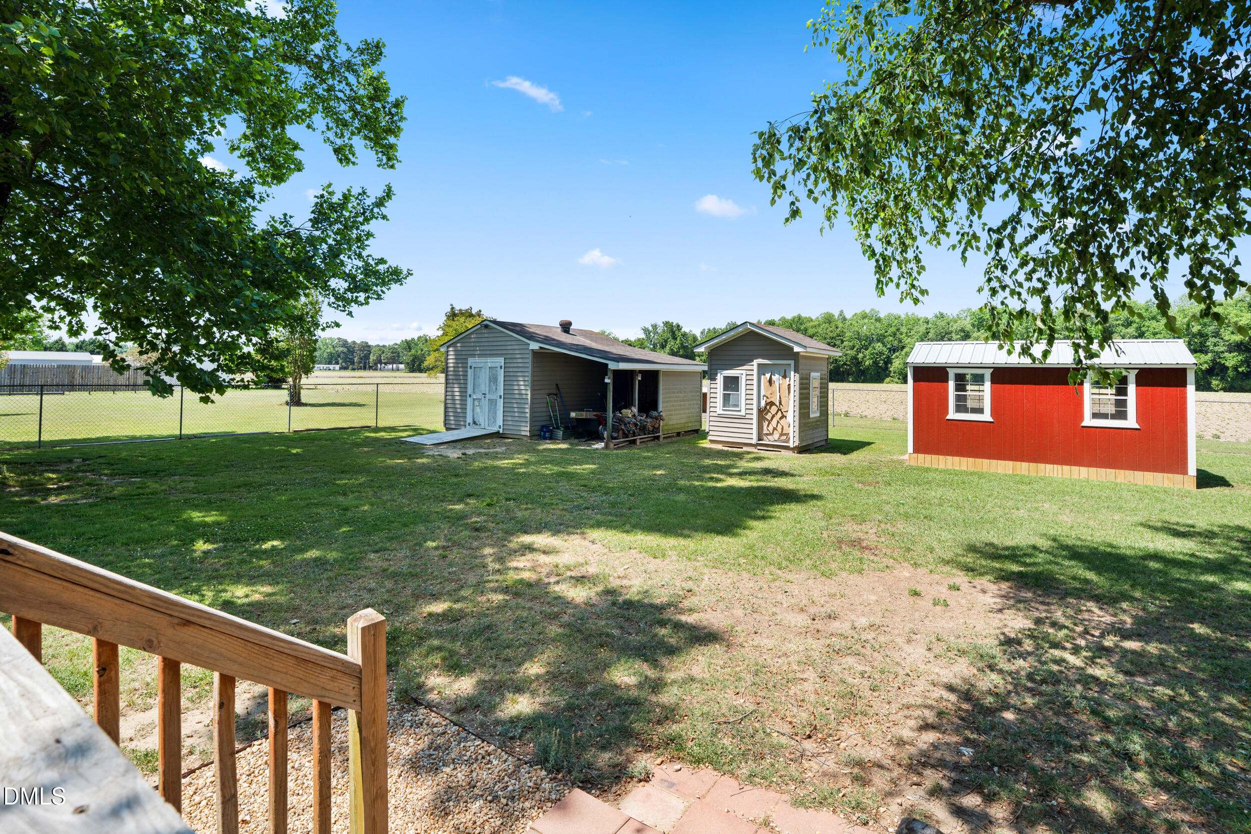 311 Bridgers Road Kenly, NC 27542 - Photo 30 of 46 a view of a house with a yard