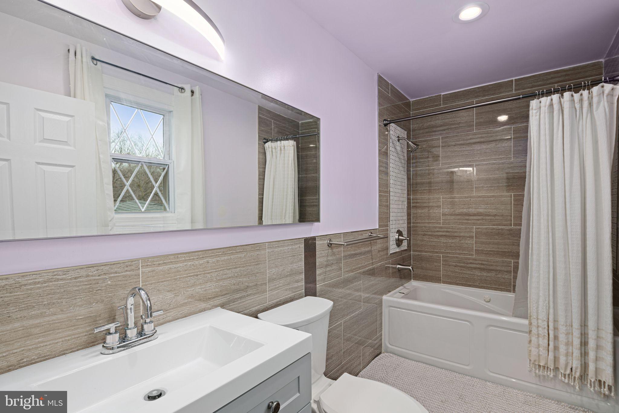 1034 Excelsior Drive Upper Chichester, PA 19014 - Photo 23 of 33 a bathroom with a sink toilet and shower