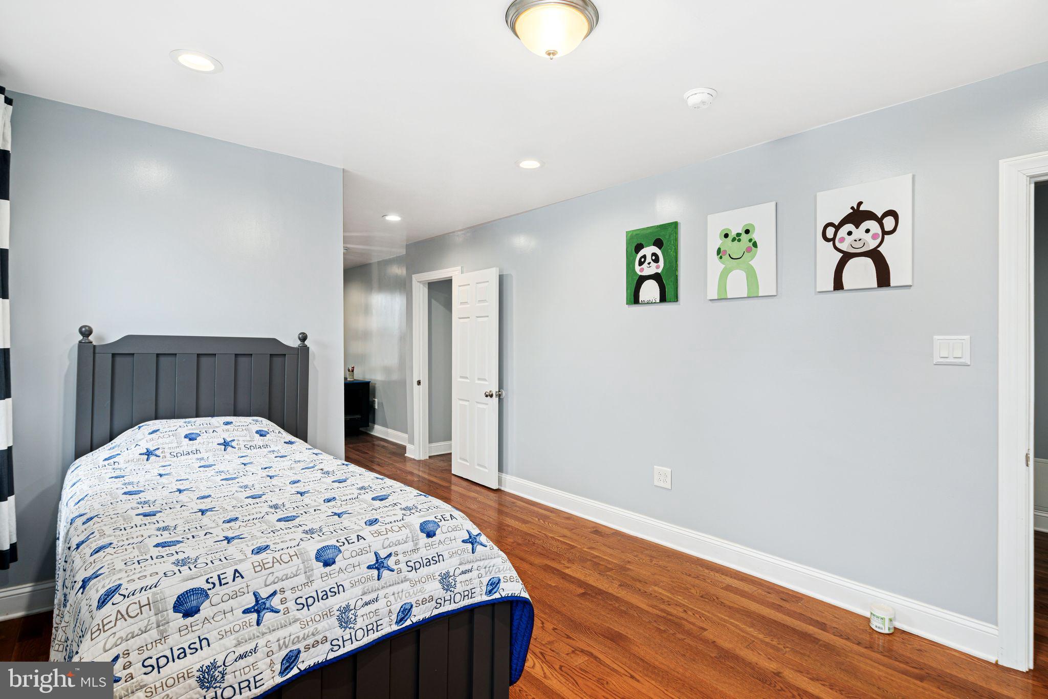 1034 Excelsior Drive Upper Chichester, PA 19014 - Photo 25 of 33 a bedroom with a bed and a dresser