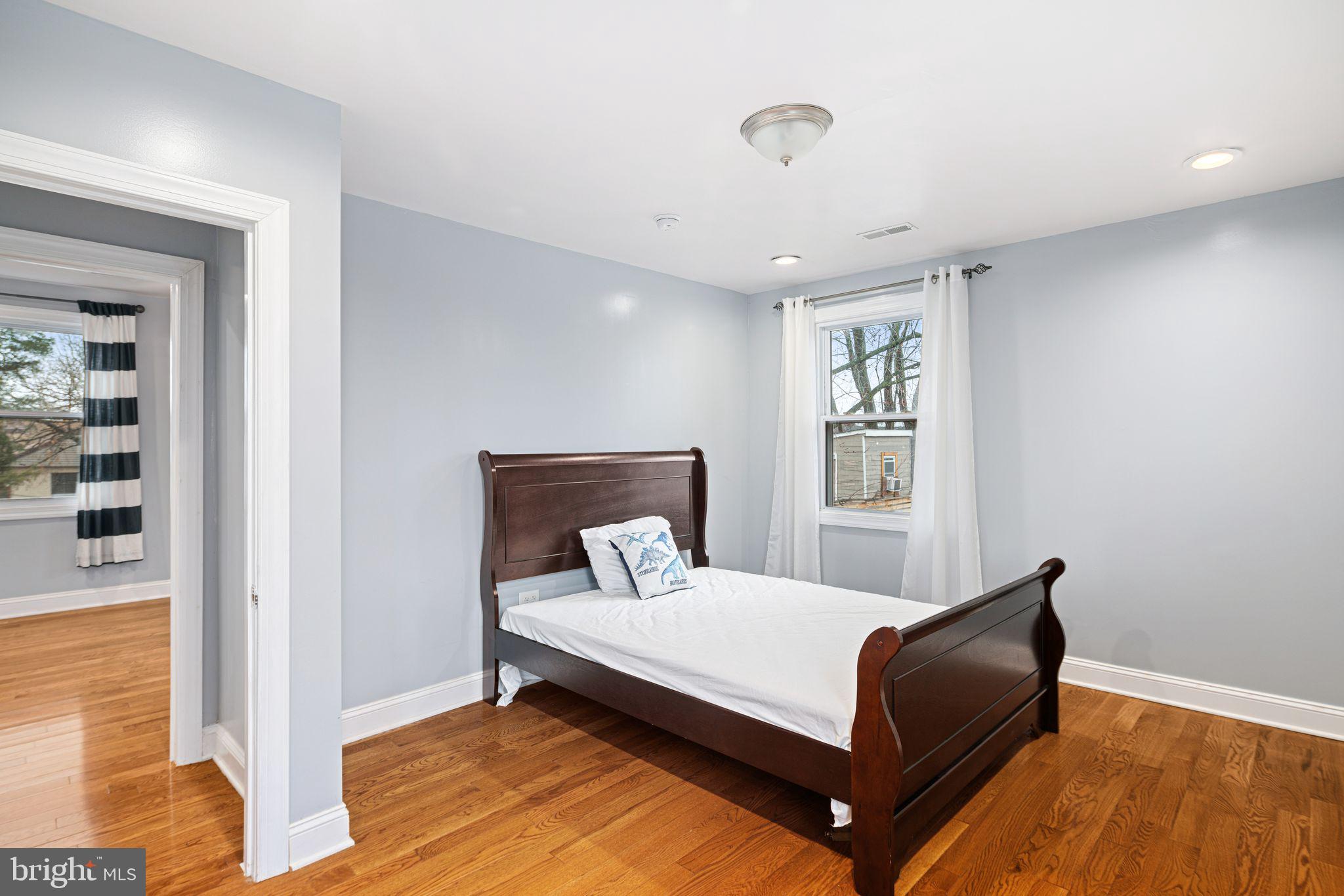 1034 Excelsior Drive Upper Chichester, PA 19014 - Photo 28 of 33 a bedroom with a bed and window