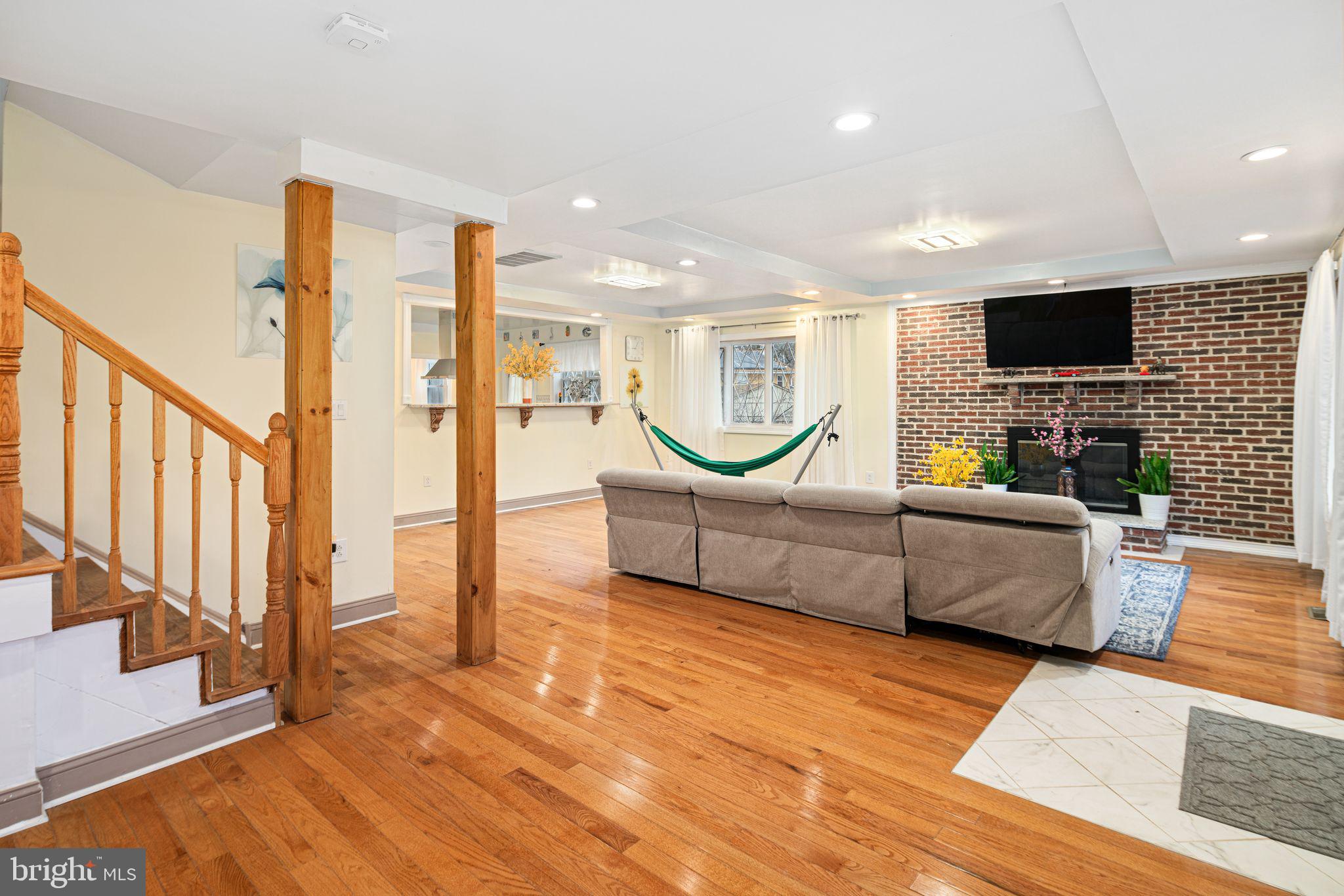1034 Excelsior Drive Upper Chichester, PA 19014 - Photo 5 of 33 a living room with furniture and a flat screen tv
