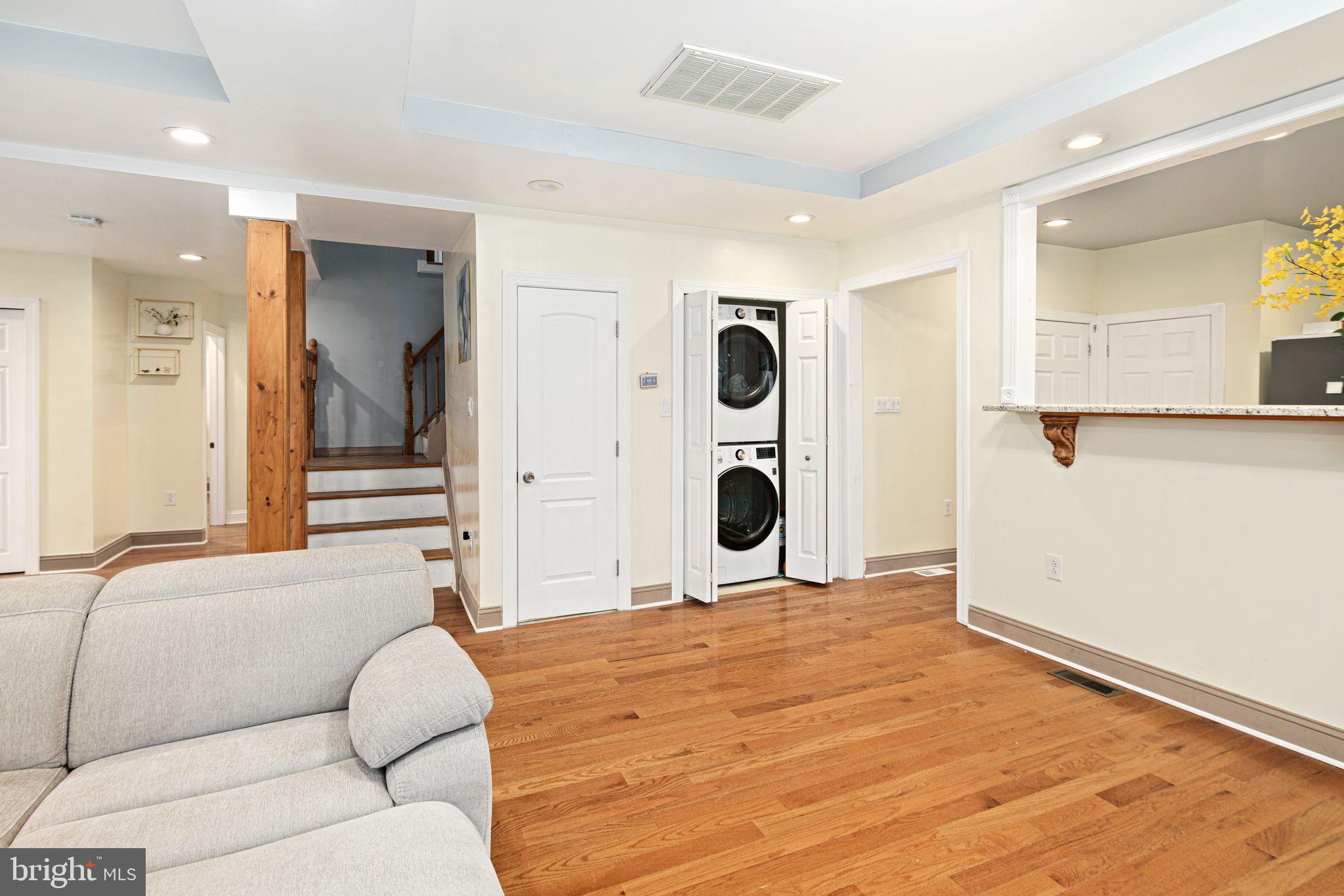 1034 Excelsior Drive Upper Chichester, PA 19014 - Photo 6 of 33 a living room with furniture and a floor to ceiling window