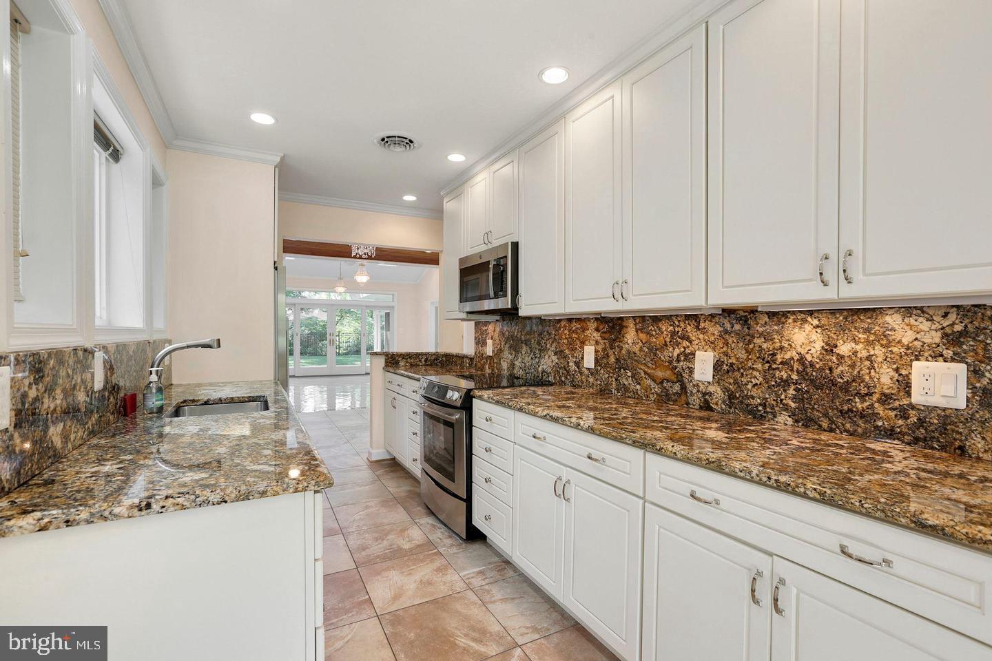 5934 Anniston Road Bethesda, MD 20817 - Photo 5 of 25 Ample Counter Space and Lot's of Cabinets