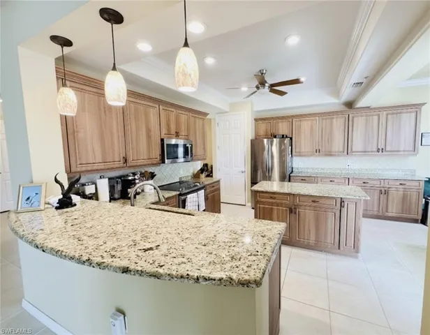 $610,000 | 12038 Covent Garden Court, Unit 704, Naples, FL 34120