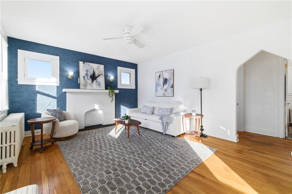 8 Esther Street Pittsburgh, PA 15227 - Photo 5 of 36 a living room with furniture and a wooden floor