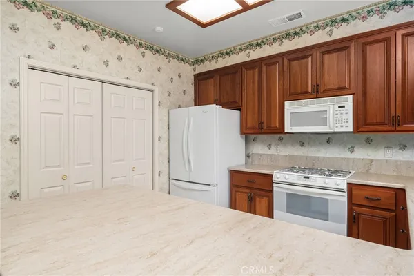 a view of kitchen and a window