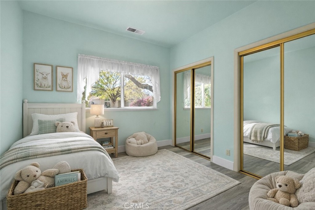 378 Picholine Way Chico, CA 95928 - Photo 18 of 52 a bedroom with a bed and a window