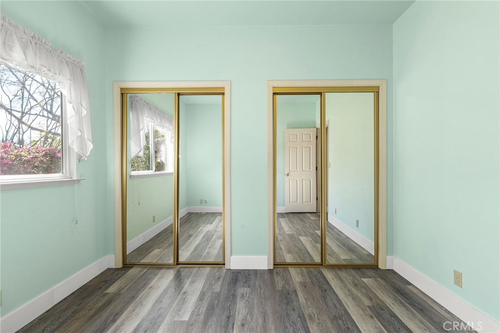 378 Picholine Way Chico, CA 95928 - Photo 20 of 52 a view of wooden floor in a room