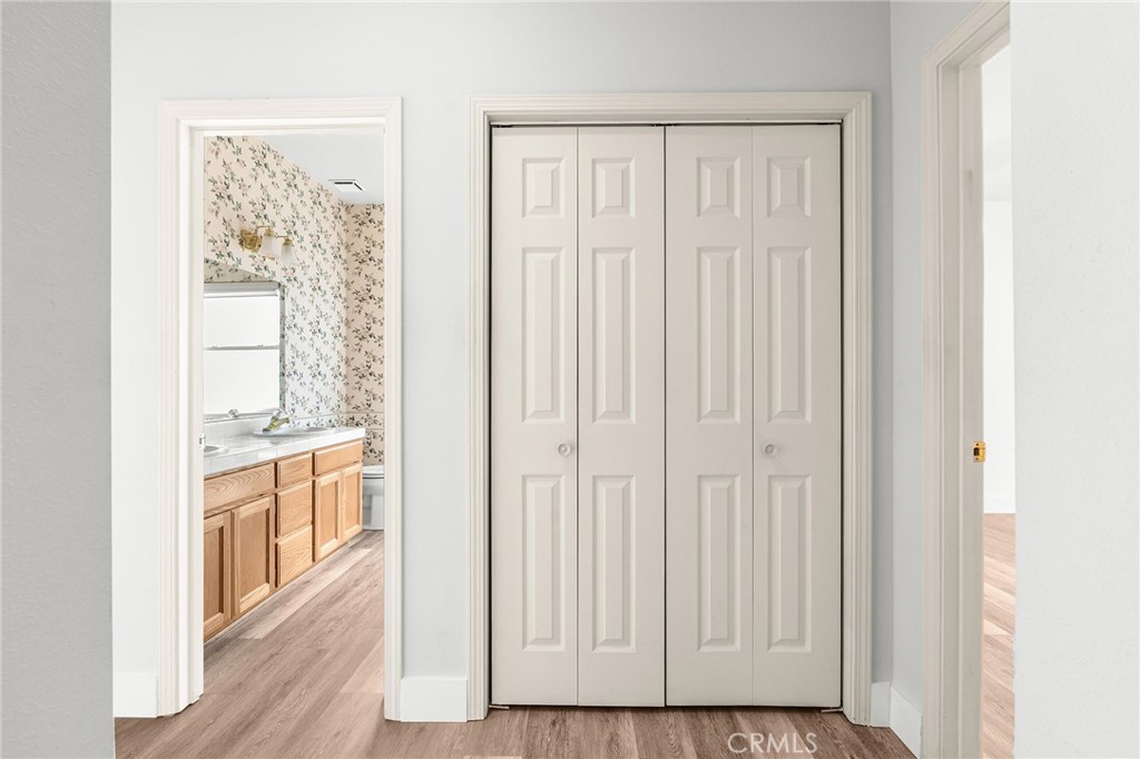 378 Picholine Way Chico, CA 95928 - Photo 23 of 52 an empty room with wooden floor and windows