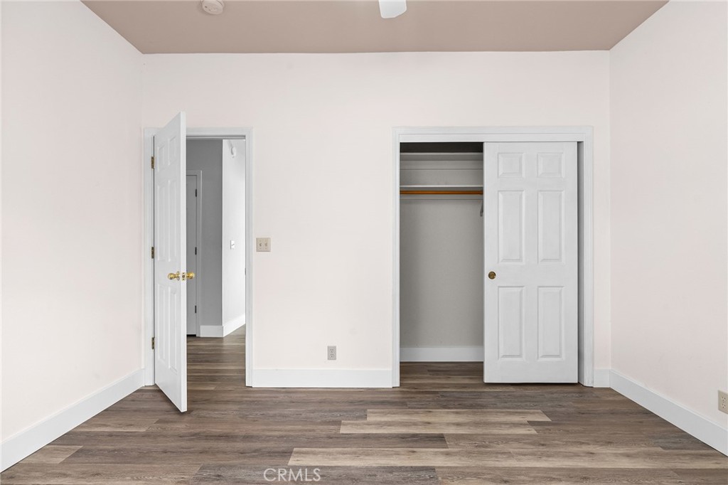 378 Picholine Way Chico, CA 95928 - Photo 26 of 52 a view of an empty room with wooden floor and closet