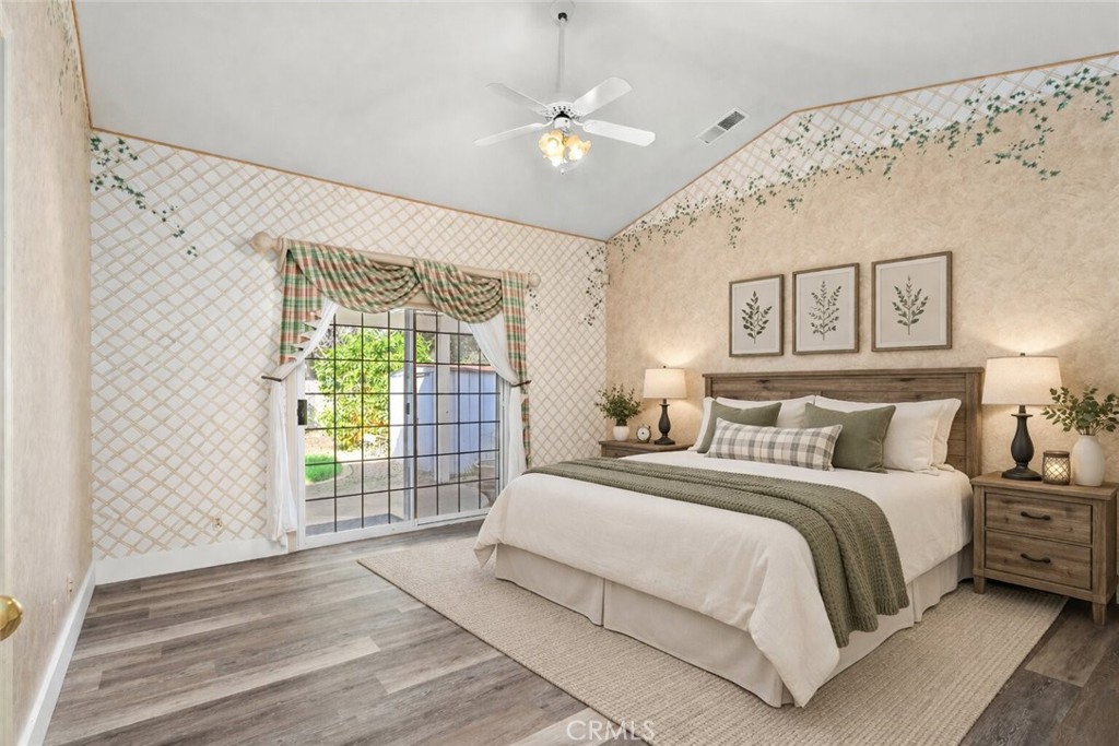 378 Picholine Way Chico, CA 95928 - Photo 28 of 52 a bedroom with a large bed and a window