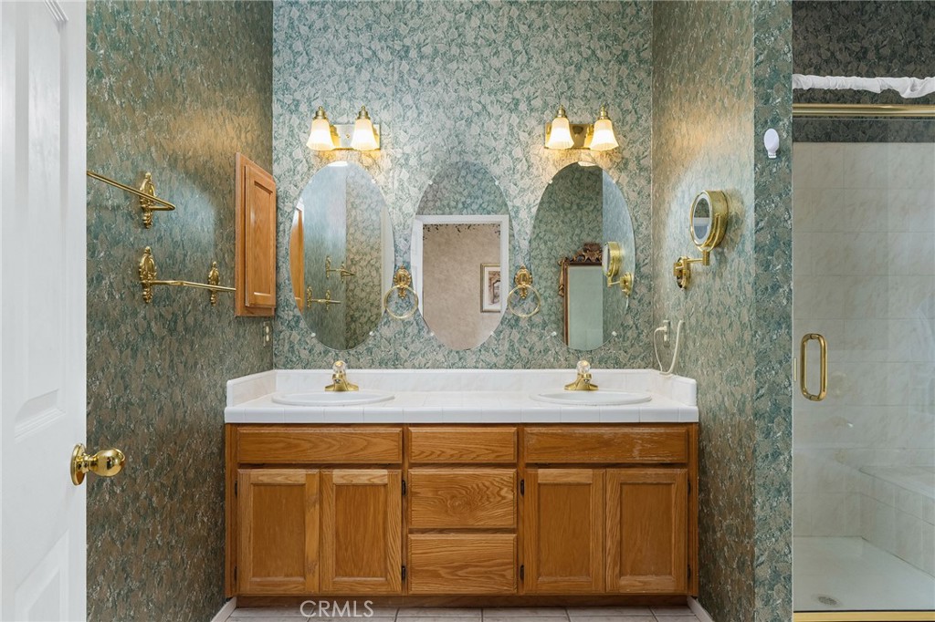 378 Picholine Way Chico, CA 95928 - Photo 32 of 52 a bathroom with a sink and a mirror
