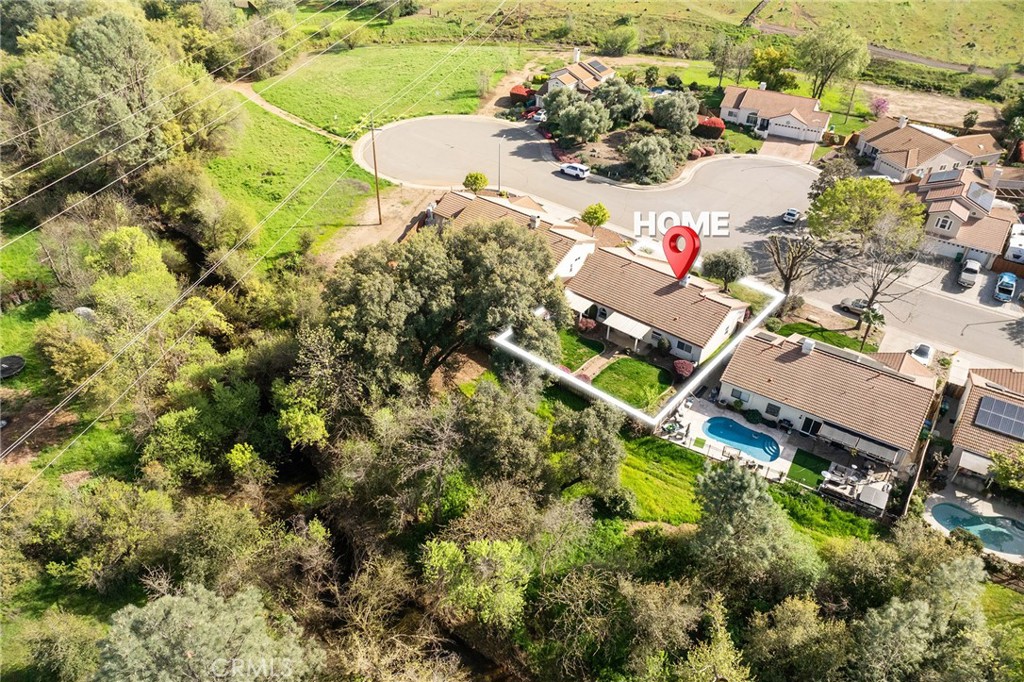 378 Picholine Way Chico, CA 95928 - Photo 51 of 52 an aerial view of a house with a yard and lake view