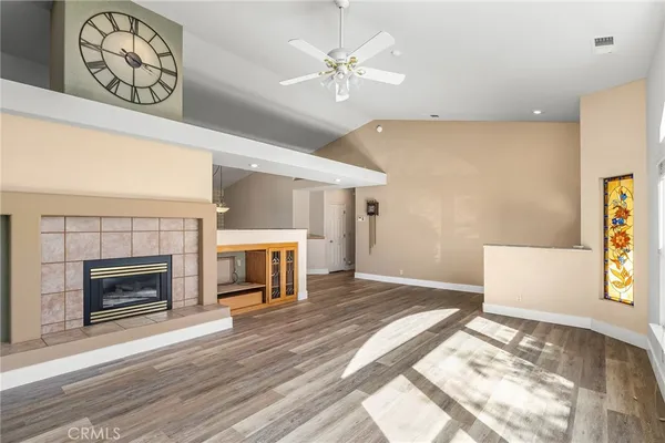 a view of kitchen with cabinets and wooden floor