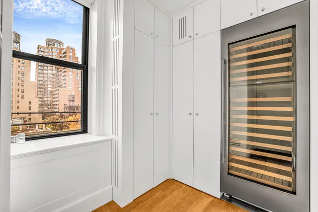 a view of a room that has a window in it