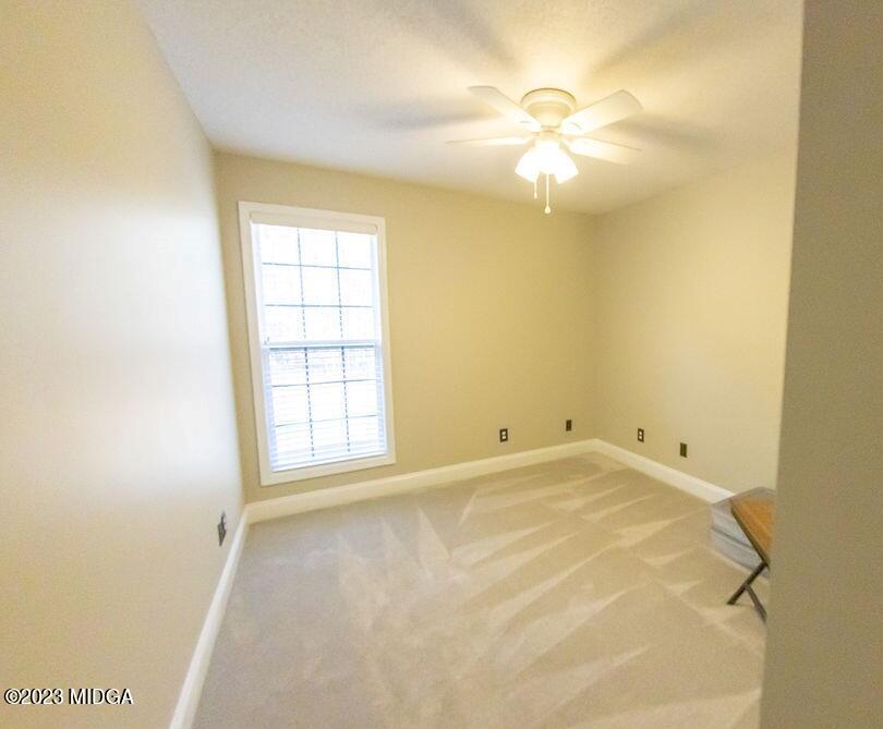1068 Boulder Drive Gray, GA 31032 - Photo 23 of 34 a view of an empty room with a window