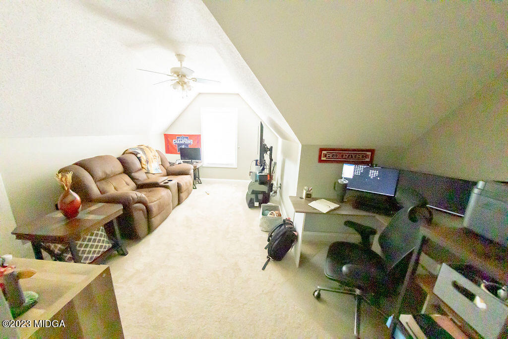1068 Boulder Drive Gray, GA 31032 - Photo 26 of 34 a living room with furniture and a window