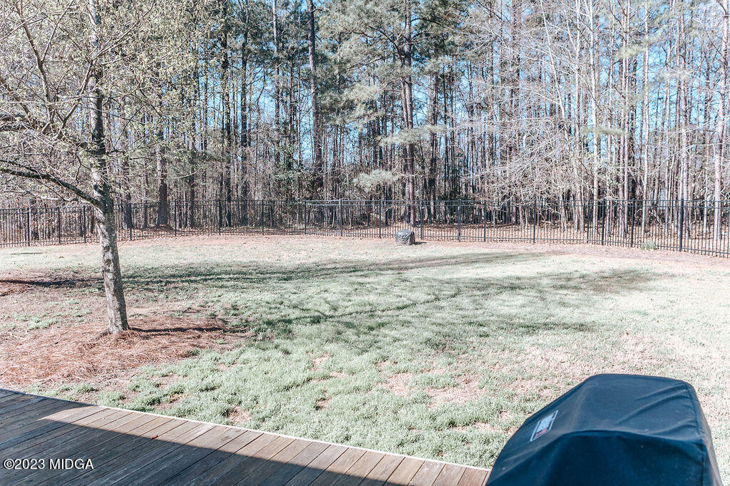 1068 Boulder Drive Gray, GA 31032 - Photo 33 of 34 a view of dirt yard with a barn
