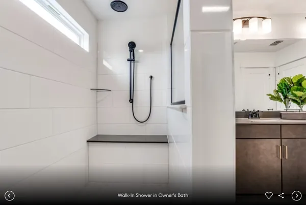 a bathroom with sink a mirror and vanity