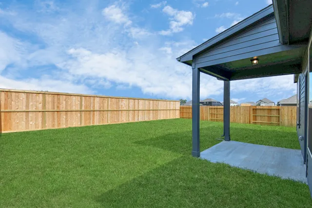 a view of a backyard with a garden