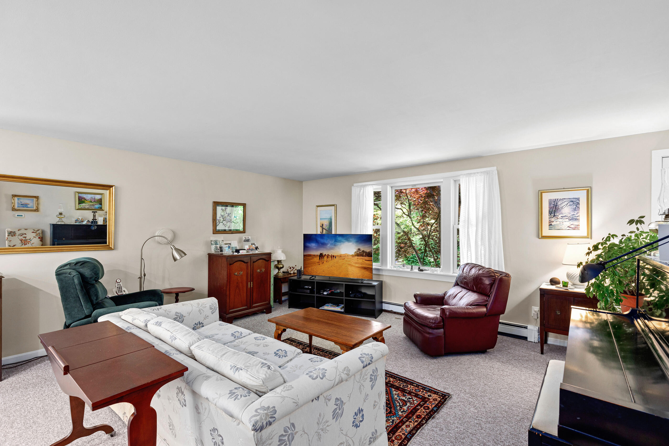 200 Hay Road Eastham, MA 02642 - Photo 8 of 24 a living room with furniture and a flat screen tv
