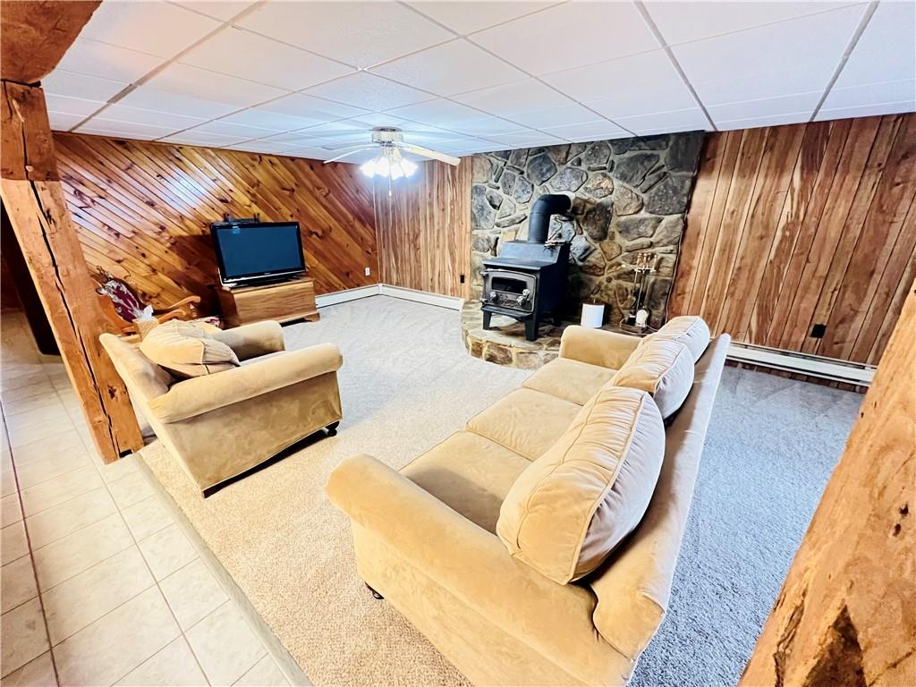 250 Flanigan Road Confluence, PA 15424 - Photo 23 of 44 a living room with furniture and a flat screen tv