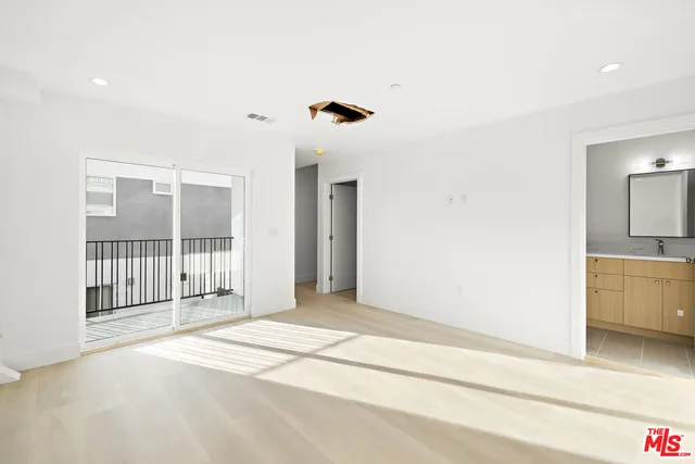 a view of a livingroom with a staircase