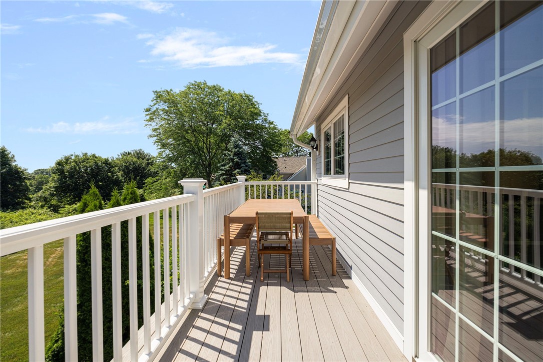 223 Corey Lane Middletown, RI 02842 - Photo 15 of 35 Second floor deck on the back side of the condo.
