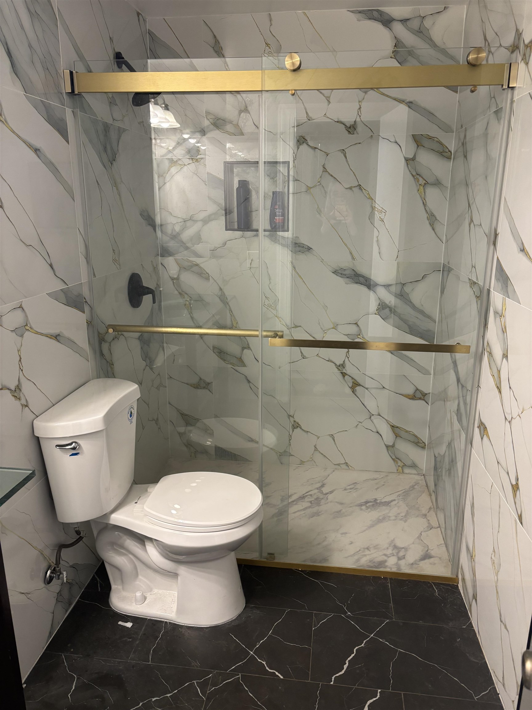 109 Centre Avenue, Unit FIRST Secaucus, NJ 07094 - Photo 14 of 19 a bathroom with a toilet and a shower