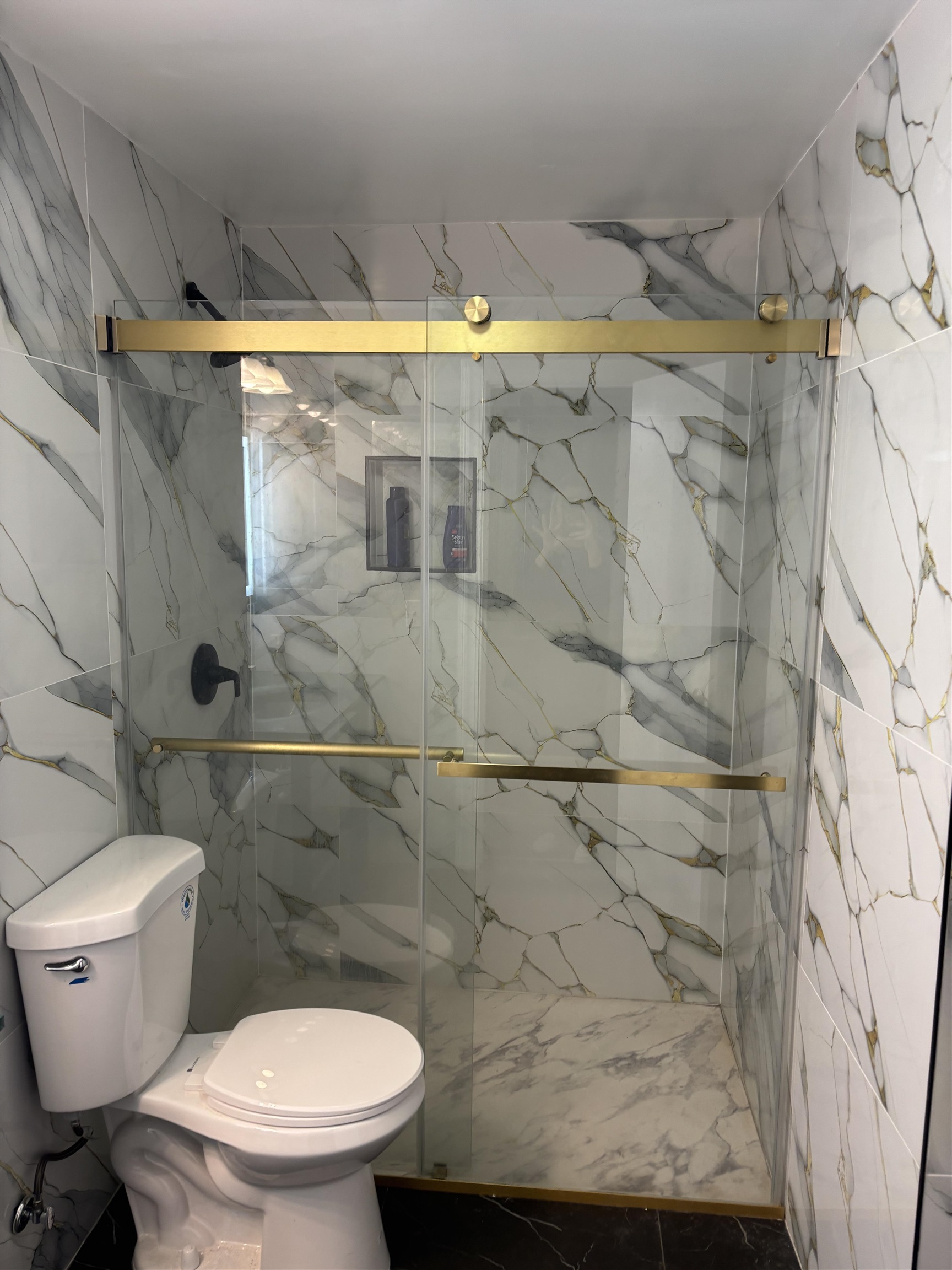 109 Centre Avenue, Unit FIRST Secaucus, NJ 07094 - Photo 17 of 19 a bathroom with a toilet and a shower