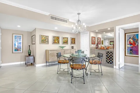 a view of a livingroom with furniture and a chandelier