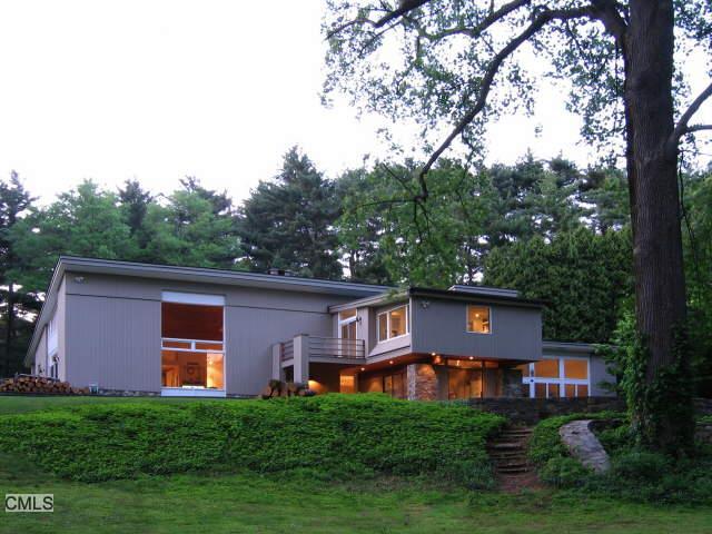 37 Geneva Road Norwalk, CT 06850 - Photo 1 of 1 a front view of a house with garden