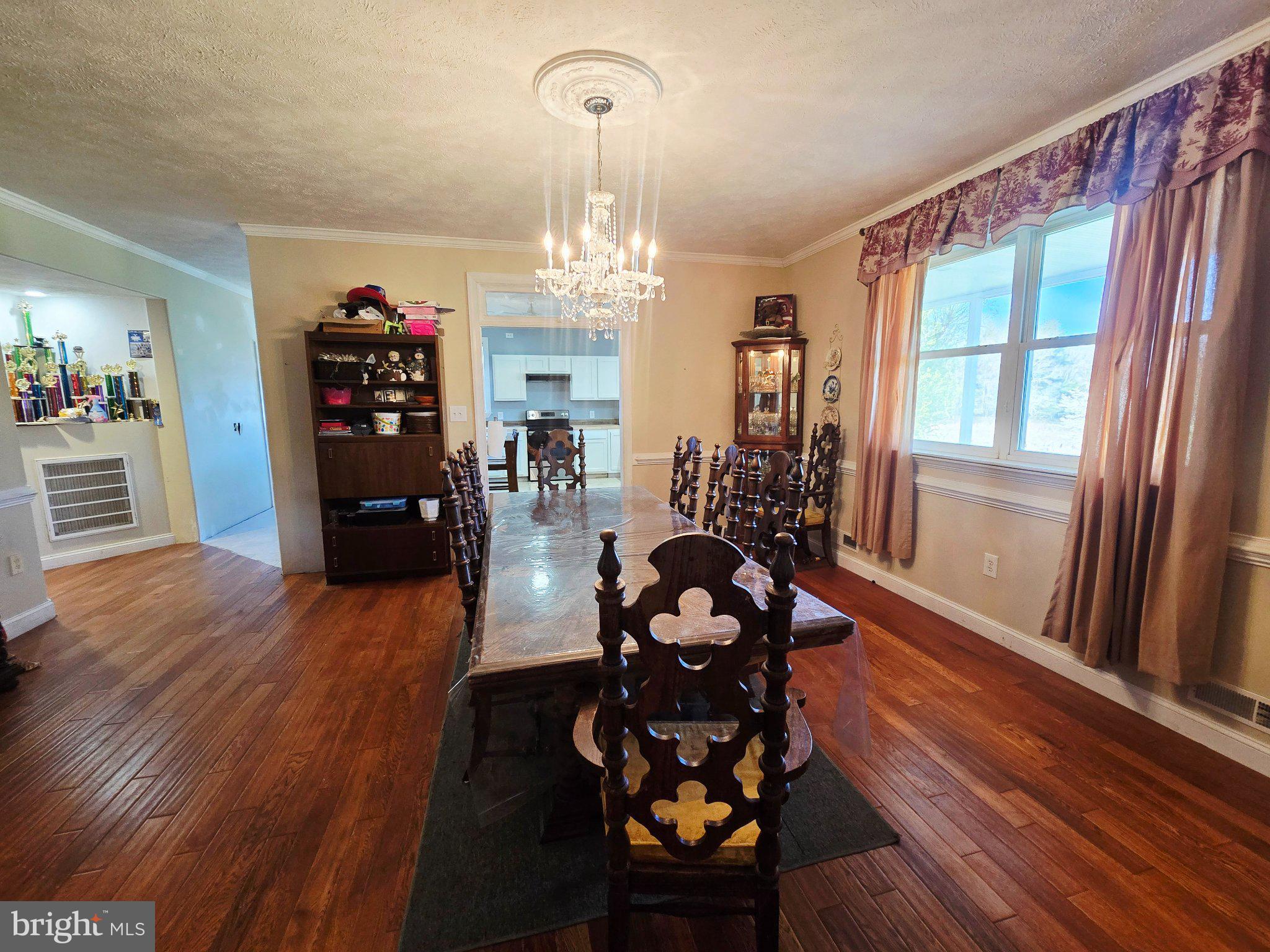 540 Plum Run Road Sugar Grove, WV 26815 - Photo 23 of 45 Elegant dining space with natural light.